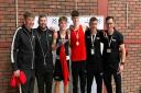 Members of Llandudno Boxing Club celebrate their success at the 2024 Welsh Amateur Boxing Championships