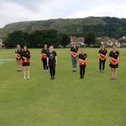 Ally Elouise with Llandudno Ladies Cricket Team as they show off their new kits!