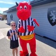 Nine-year-old Hollie is a big fan of Llandudno FC. Photo: Hayley Jenkins