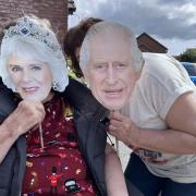 Neighbours get into the spirit with King Charles and Queen Camilla face masks in Deganwy!
