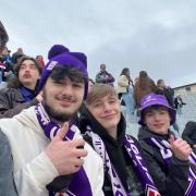 Students at a Fiorentina football match