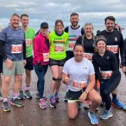 Runners from the Black Cloak Runners, Dalzell Runners, and a variety of other local running groups at the NIck Beer 10k