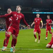 Neco Williams (second left) celebrates after scoring Wales’ second goal in their 4-1 Euro 2024 play-off victory over Finland.