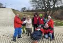 Rhos-on-Sea Rotary President Pauline Hogan presents the cheque to members of the local Para Snow Sports Wales group.