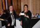 Mayor of Llandudno, Cllr Carol Marubbi receiving a cheque for the Mayor's annual charity.