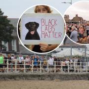 Thousands turned out for the walking protest. One of the placards read 'Black Labs Matter'