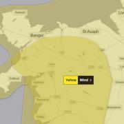 A weather warning for wind has been extended in North Wales.