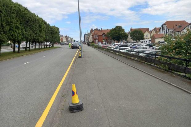 Workers have been installing parking restrictions on Gloddaeth Avenue, Llandudno
Pic: David Christopher Allen Hall-Say (clear for use by all partners)