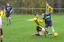 Action from St Asaph City's friendly win over Kinmel Bay (Photo by Richard Bates)