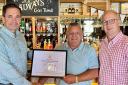 Robin Millar MP presents the award to pub licensee Jason Taylor and William Robinson, the Chief Executive of Robinson’s Brewery.