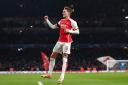 Martin Odegaard celebrates scoring for Arsenal against Lens (John Walton/PA)