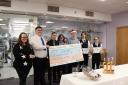 Tŷ Gobaith fundraiser Vanessa Marubbi (far left) with students from the Hospitality and Catering team at Coleg Llandrillo.