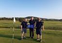 (L-R) Simon Neville, Adrian Owen and Chris Curry after completing their 50-hole golf challenge at Rhos-on-Sea Golf Club