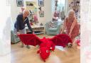 An auction was held for Bryn the dragon which raised £300!