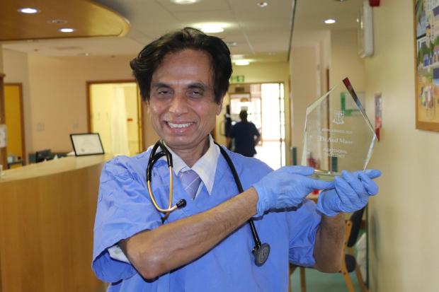 North Wales Pioneer: Dr Anil Mane with his award
