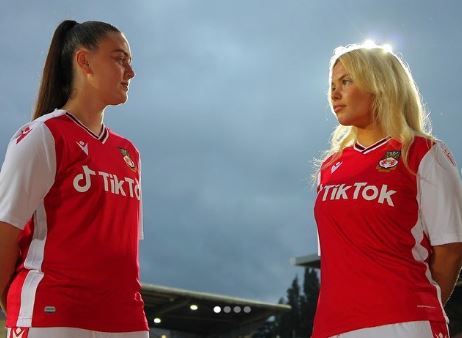 The Wrexham AFC womens-fit shirt campaign features defender Erin Lovett and midfielders Kim Dutton and Tonicha Jade Dickens. 