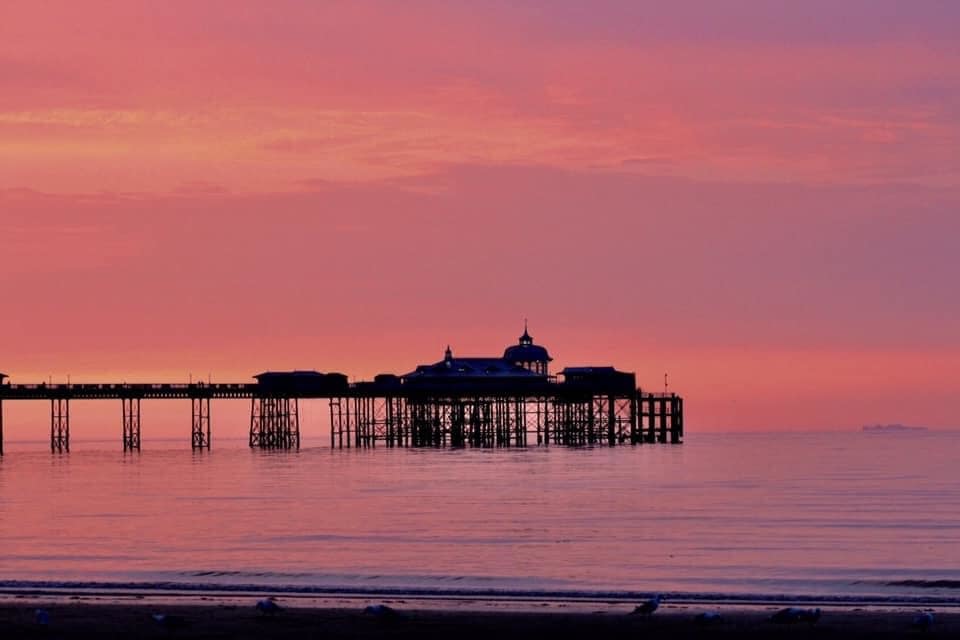 Llandudno Pier in pink. Picture: Barry Langford