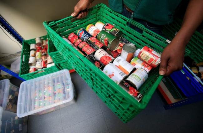 Stock image of a basket of food bank donations