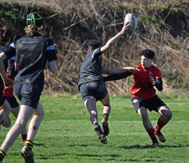 North Wales Pioneer: A player runs for the try line