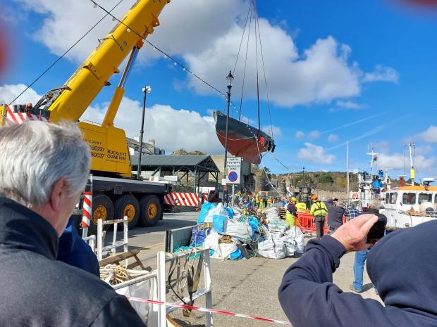 North Wales Pioneer: The Helen II boat being carried by the crane