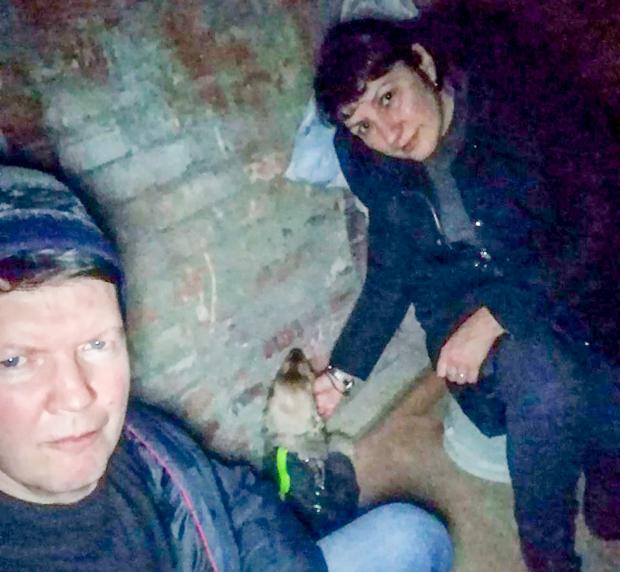 North Wales pioneer: Veronika's parents and their dog in an air-raid shelter in Kharkiv in February