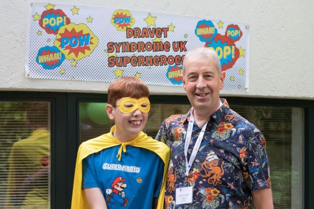 Iwan Hughes, and dad., Kelvin at the Dravet Syndrome UK's recent annual weekend for families.