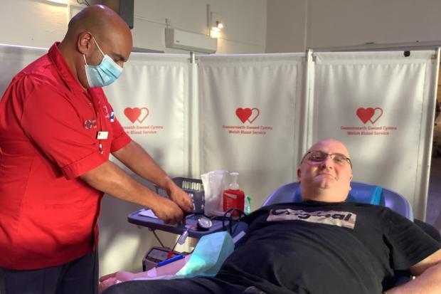 Gareth Griffiths donating blood.