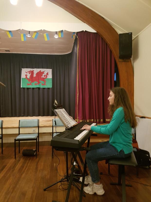 North Wales Pioneer: Elina, who is Ukrainian, playing piano at the concert. Photo: Helen Denning