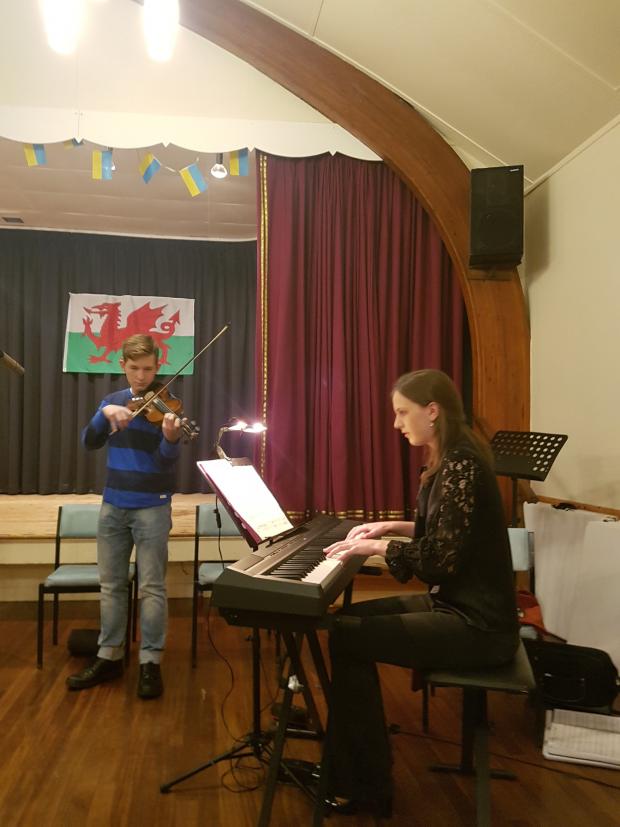 North Wales Pioneer: Denys, who is Ukrainian, and Maria, who is half-Ukrainian, performing at the concert. Photo: Helen Denning