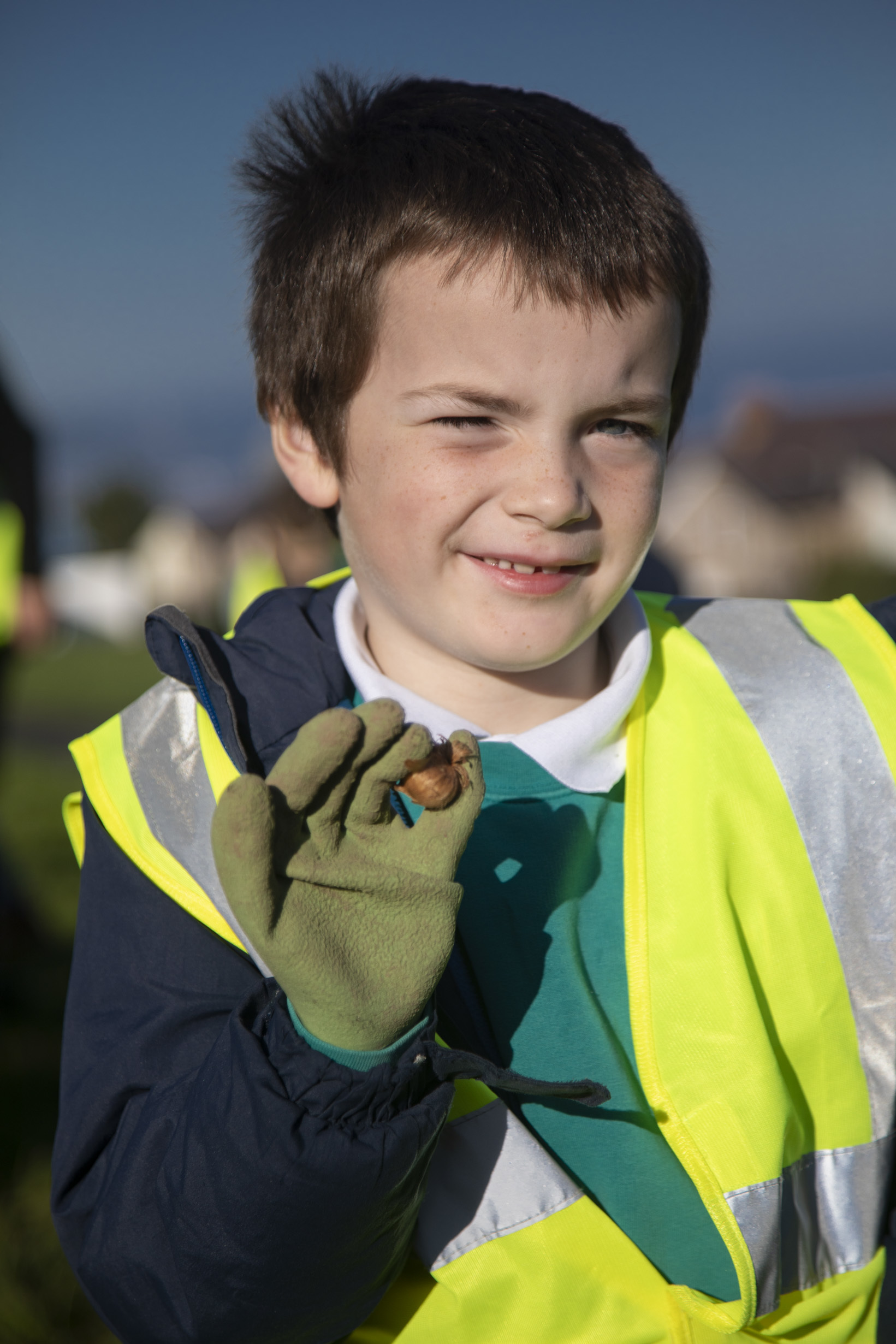 Cartrefi Conwy tree planting on the Peulwys estate; Ysgol Swn y Don Pupil Johno ready to plant the bulbs. Picture Mandy Jones