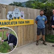 Clwyd West MS Darren Millar with Manorafon Farm Park Managing Director, Will Arrowsmith and Mr Millar with one of the farm animals