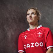 Keira Bevan in the new Wales rugby home jersey, available from the WRU store and Macron. Credit: WRU