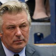 A prop firearm discharged by veteran actor Alec Baldwin, who is starring and producing a Western movie, killed his director of photography and injured the director