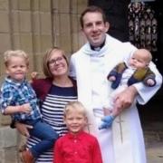Rev'd Ben Lines pictured with his wife Catrin and young family