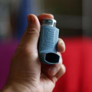 A person holding an Ivax Reliever inhaler for the treatment of asthma, as rising pollen levels this weekend could leave people with asthma at risk of life-threatening asthma attack. Credit: PA