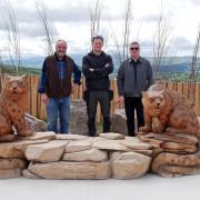 (L-R) Simon Bellfield, Edward Parkes, Neil Morris with the new sculpture. Photo: Welsh Mountain Zoo