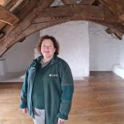 Plas Mawr custodian Sarah Naylor at Plas Mawr in the attic room..