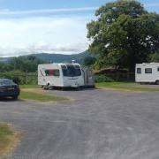 A planning application has been submitted to Conwy County Council for a change of use for the land at Eirianws Farm, near Tyn y Groes.  Pictured: existing caravans at the site..