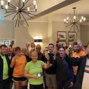 Runners raise a glass in memory of John Dalzell