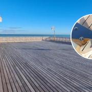 Colwyn Bay's Victoria Pier. Inset: the vandalised bench.