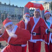 Hannah Griffith with her friends and family at the start of the Santa Dash