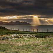 Chris V Evans took this one of Dinas Dinlle Iron Age hillfort with rays over Yr Eifl.