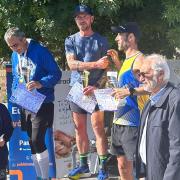 Jonathan Kettle on top of the podium after his half narathon victory in Cyprus.