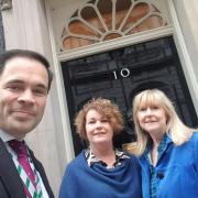 Robin Millar MP with Rhian Owen and Rhian Williams outside No. 10 Downing Street.