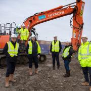 Key stakeholders from K & C Construction and ClwydAlyn visited the site to mark the restart in works.
