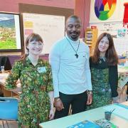 (L-R) Rachel Evans (Museums Officer), Mfikela Jean Samuel (Artist), Aimee Jones (Ysgol Bryn Elian) at a workshop for pupils from Ysgol Bryn Elian